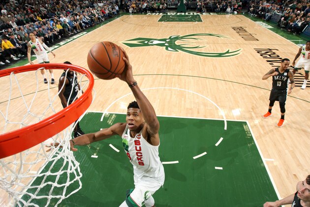 MILWAUKEE, WI - DECEMBER 29: Giannis Antetokounmpo #34 of the Milwaukee Bucks dunks the ball against the Brooklyn Nets on December 29, 2018 at the Fiserv Forum in Milwaukee, Wisconsin. NOTE TO USER: User expressly acknowledges and agrees that, by downloading and/or using this photograph, user is consenting to the terms and conditions of the Getty Images License Agreement. Mandatory Copyright Notice: Copyright 2018 NBAE (Photo by Gary Dineen/NBAE via Getty Images)