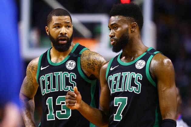 BOSTON, MA - MARCH 31:  Marcus Morris #13 and Jaylen Brown #7 of the Boston Celtics look on during a game against the Toronto Raptors at TD Garden on March 31, 2018 in Boston, Massachusetts. NOTE TO USER: User expressly acknowledges and agrees that, by downloading and or using this photograph, User is consenting to the terms and conditions of the Getty Images License Agreement. (Photo by Adam Glanzman/Getty Images)