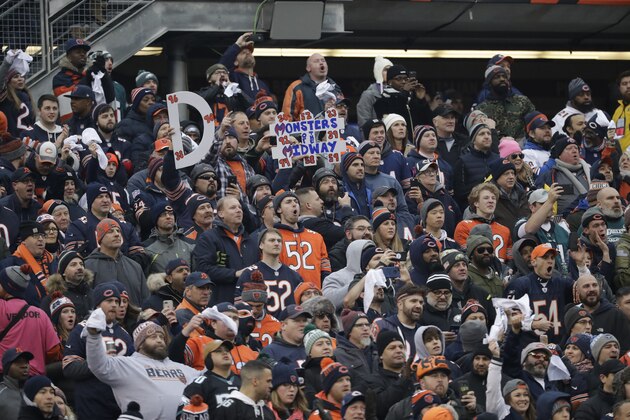 Fans at Soldier Field stand for the national anthem before an NFL wild-card playoff football game between the Chicago Bears and Philadelphia Eagles Sunday, Jan. 6, 2019, in Chicago. (AP Photo/Nam Y. Huh)