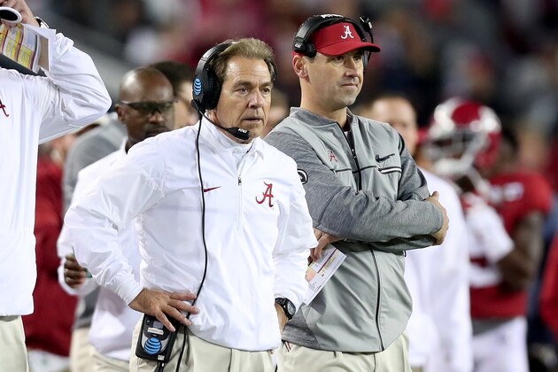 TAMPA, FL - JANUARY 09:  Head coach Nick Saban (L) and offensive coordinator Steve Sarkisian of the Alabama Crimson Tide stand on the sideline during the second half of the 2017 College Football Playoff National Championship Game against the Clemson Tigers at Raymond James Stadium on January 9, 2017 in Tampa, Florida.  (Photo by Tom Pennington/Getty Images)