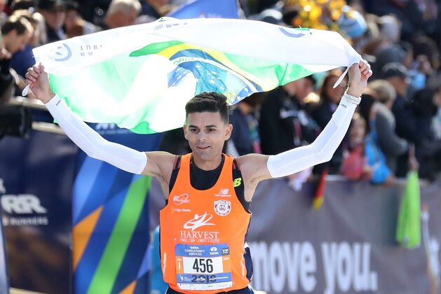 NEW YORK, NY - NOVEMBER 04:  Fredison Costa of Brazil crosses the finish line during the 2018 TCS New York City Marathon on November 4, 2018 in Central Park in New York City.  (Photo by Elsa/Getty Images)