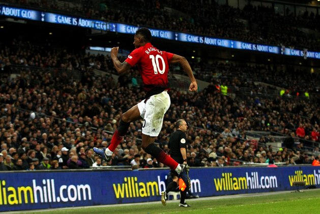 LONDON, ENGLAND - JANUARY 13: Marcus Rashford of Manchester United celebrates scoring his teams first goal during the Premier League match between Manchester United and Tottenham Hotspur at Wembley Stadium on January 13, 2019 in London, United Kingdom. (Photo by Chloe Knott - Danehouse/Getty Images)