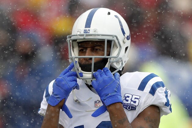 Indianapolis Colts wide receiver T.Y. Hilton (13) adjusts his helmet before an NFL divisional football playoff game against the Kansas City Chiefs in Kansas City, Mo., Saturday, Jan. 12, 2019. (AP Photo/Charlie Neibergall)