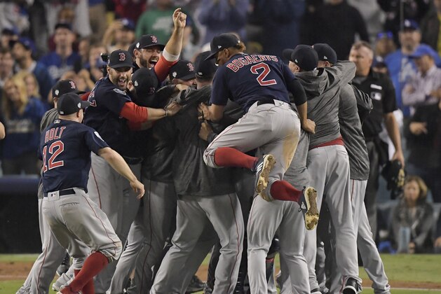 The Boston Red Sox celebrate after Game 5 of baseball's World Series against the Los Angeles Dodgers on Sunday, Oct. 28, 2018, in Los Angeles. The Red Sox won 5-1 to win the series 4 games to 1. (AP Photo/Mark J. Terrill)