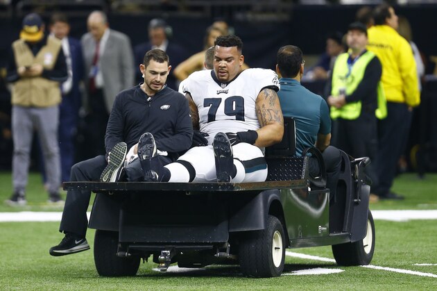 Philadelphia Eagles offensive guard Brandon Brooks (79) is taken from the field after injury against the New Orleans Saints in the first half of an NFL divisional playoff football game in New Orleans, Sunday, Jan. 13, 2019. (AP Photo/Butch Dill)