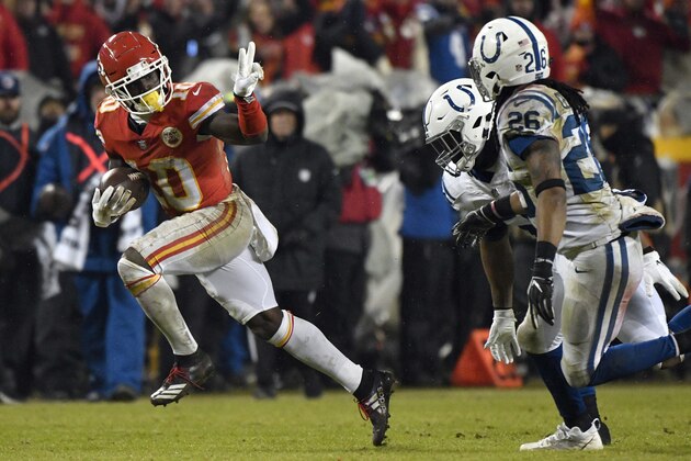 Kansas City Chiefs wide receiver Tyreek Hill (10) gestures as he runs past Indianapolis Colts safety Clayton Geathers (26) and linebacker Anthony Walker during the second half of an NFL divisional football playoff game in Kansas City, Mo., Saturday, Jan. 12, 2019. (AP Photo/Ed Zurga) Kansas City Chiefs wide receiver Tyreek Hill (10) gestures as he runs past Indianapolis Colts safety Clayton Geathers (26) and linebacker Anthony Walker during the second half of an NFL divisional football playoff game in Kansas City, Mo., Saturday, Jan. 12, 2019. (AP Photo/Ed Zurga)