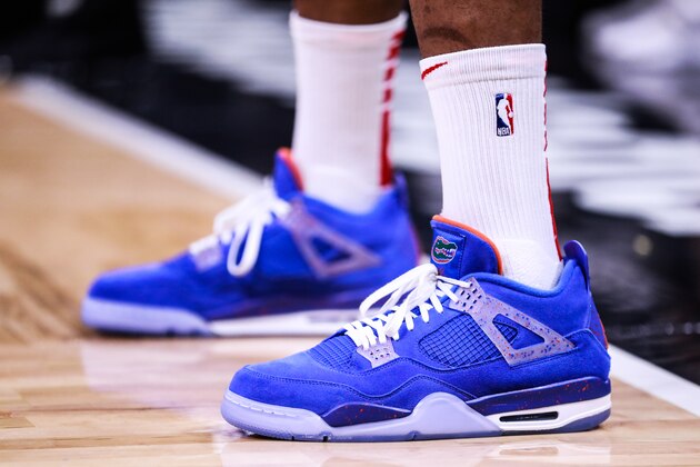 ORLANDO, FLORIDA - JANUARY 13: P.J. Tucker #17 of the Houston Rockets sports a pair of the rare Players Edition Florida Gators Air Jordan IVs in the second quarter at Amway Center on January 13, 2019 in Orlando, Florida. NOTE TO USER: User expressly acknowledges and agrees that, by downloading and or using this photograph, User is consenting to the terms and conditions of the Getty Images License Agreement. (Photo by Harry Aaron/Getty Images)