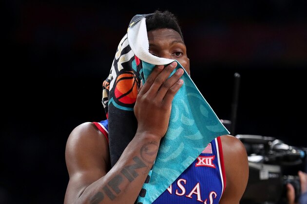 SAN ANTONIO, TX - MARCH 31:  Silvio De Sousa #22 of the Kansas Jayhawks reacts after being defeated by the Villanova Wildcats during the 2018 NCAA Men's Final Four Semifinal at the Alamodome on March 31, 2018 in San Antonio, Texas. Villanova defeated Kansas 95-79.  (Photo by Tom Pennington/Getty Images)