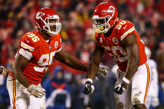 KANSAS CITY, MO - JANUARY 12: Justin Houston #50 of the Kansas City Chiefs celebrates a sack against the Indianapolis Colts with teammate Chris Jones #95 during the third quarter of the AFC Divisional Round playoff game at Arrowhead Stadium on January 12, 2019 in Kansas City, Missouri. (Photo by Jamie Squire/Getty Images)