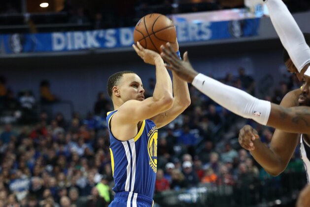 DALLAS, TEXAS - JANUARY 13:  Stephen Curry #30 of the Golden State Warriors takes a shot against the Dallas Mavericks at American Airlines Center on January 13, 2019 in Dallas, Texas.  NOTE TO USER: User expressly acknowledges and agrees that, by downloading and or using this photograph, User is consenting to the terms and conditions of the Getty Images License Agreement. (Photo by Ronald Martinez/Getty Images)