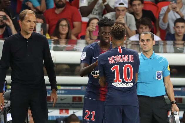PARIS, FRANCE - AUGUST 12:  head coach Thomas Tuchel of Paris Saint-Germain react with Neymar Jr and Timothy Weah during the Ligue 1 match between Paris Saint Germain and SM Caen at Parc des Princes on August 12, 2018 in Paris, France.  (Photo by Xavier Laine/Getty Images)