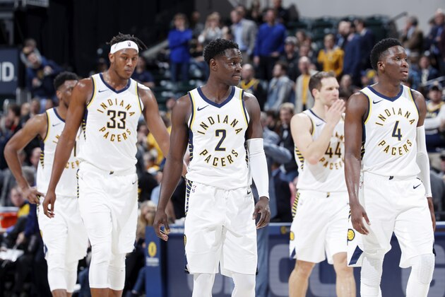 INDIANAPOLIS, IN - DECEMBER 12: Darren Collison #2, Victor Oladipo #4 and Myles Turner #33 of the Indiana Pacers lead the team back on the floor during the game against the Milwaukee Bucks at Bankers Life Fieldhouse on December 12, 2018 in Indianapolis, Indiana. The Pacers won 113-97. NOTE TO USER: User expressly acknowledges and agrees that, by downloading and or using the photograph, User is consenting to the terms and conditions of the Getty Images License Agreement. (Photo by Joe Robbins/Getty Images)