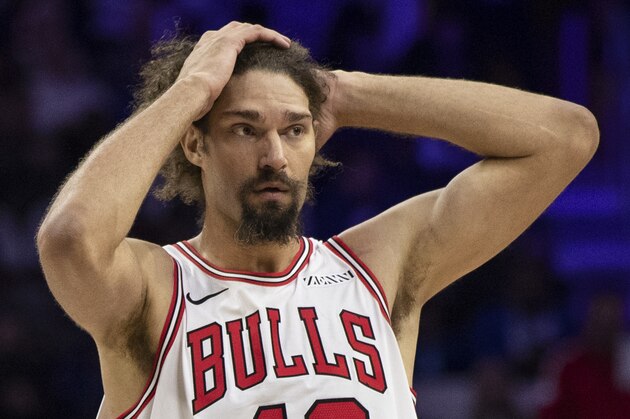 Chicago Bulls Robin Lopez reacts during the first half of an NBA basketball game against the Philadelphia 76ers, Thursday, Oct. 18, 2018, in Philadelphia. The 76ers won 127-108. (AP Photo/Chris Szagola)