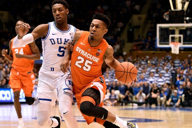 DURHAM, NORTH CAROLINA - JANUARY 14:  Tyus Battle #25 of the Syracuse Orange drives against RJ Barrett #5 of the Duke Blue Devils during the first half of their game at Cameron Indoor Stadium on January 14, 2019 in Durham, North Carolina. (Photo by Grant Halverson/Getty Images)