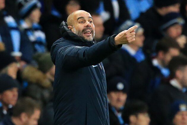 Manchester City's Spanish manager Pep Guardiola gestures on the touchline during the English Premier League football match between Manchester City and Wolverhampton Wanderers at the Etihad Stadium in Manchester, north west England, on January 14, 2019. (Photo by Lindsey PARNABY / AFP) / RESTRICTED TO EDITORIAL USE. No use with unauthorized audio, video, data, fixture lists, club/league logos or 'live' services. Online in-match use limited to 120 images. An additional 40 images may be used in extra time. No video emulation. Social media in-match use limited to 120 images. An additional 40 images may be used in extra time. No use in betting publications, games or single club/league/player publications. /         (Photo credit should read LINDSEY PARNABY/AFP/Getty Images)