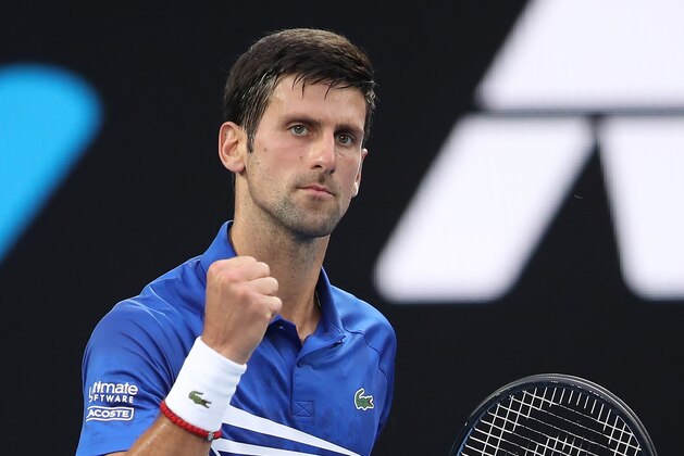 MELBOURNE, AUSTRALIA - JANUARY 15:  Novak Djokovic of Serbia celebrates a point in his first round match against Mitchell Krueger of the United States during day two of the 2019 Australian Open at Melbourne Park on January 15, 2019 in Melbourne, Australia.  (Photo by Mark Kolbe/Getty Images)