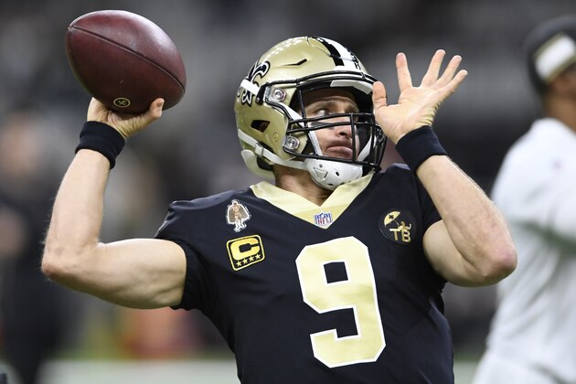 New Orleans Saints quarterback Drew Brees (9) warms up before an NFL divisional playoff football game between the New Orleans Saints and the Philadelphia Eagles, in New Orleans, Sunday, Jan. 13, 2019. (AP Photo/Bill Feig)
