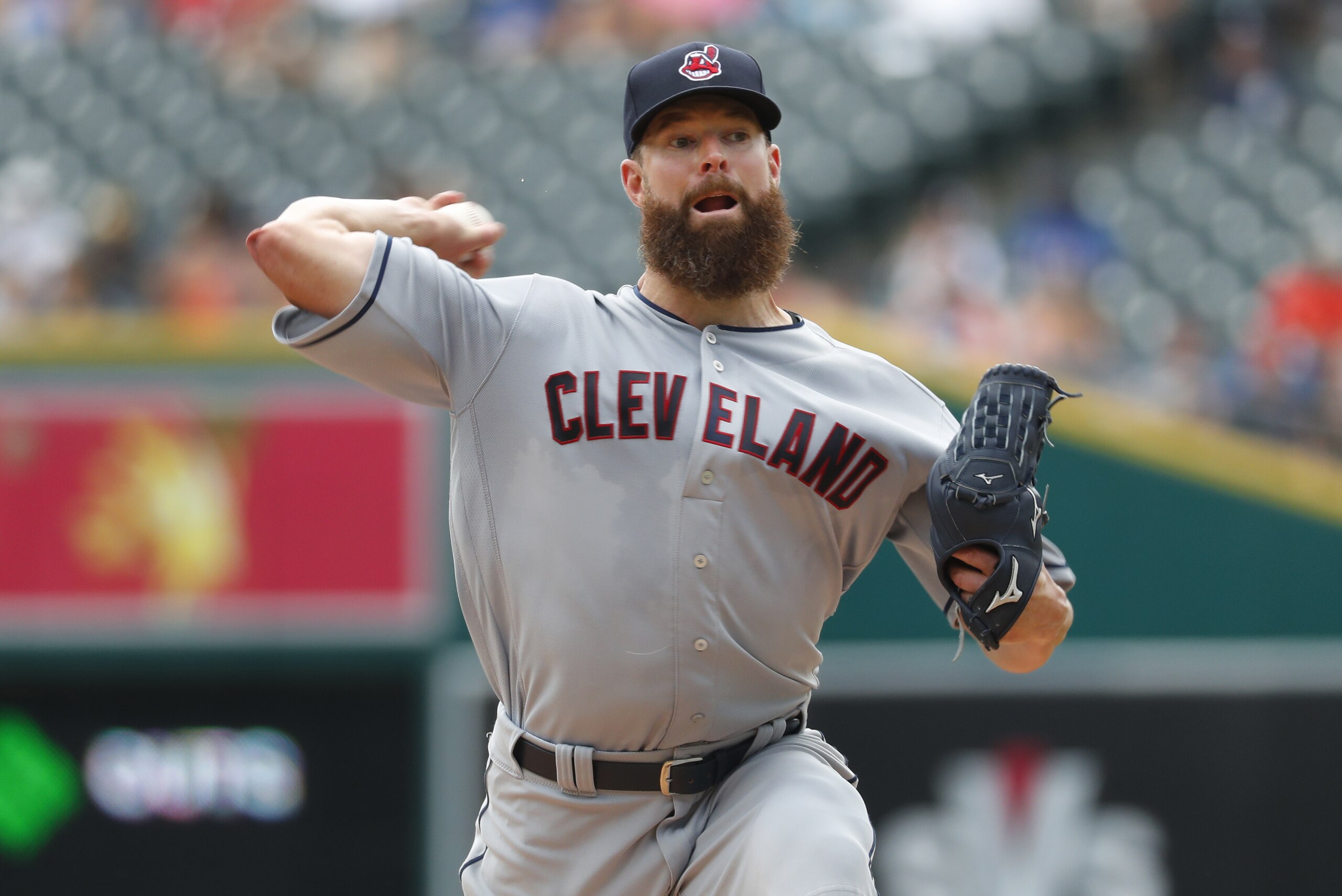 Cleveland Indians pitcher Corey Kluber throws against the Detroit Tigers in the first inning of a baseball game in Detroit, Sunday, July 29, 2018. (AP Photo/Paul Sancya)