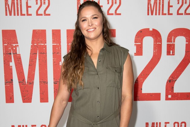Actress/wrestler Ronda Rousey poses during the Photo Call for Mile 22, on July 28, 2018, in Beverly Hills, California. (Photo by VALERIE MACON / AFP) (Photo credit should read VALERIE MACON/AFP/Getty Images) Actress/wrestler Ronda Rousey poses during the Photo Call for Mile 22, on July 28, 2018, in Beverly Hills, California. (Photo by VALERIE MACON / AFP) (Photo credit should read VALERIE MACON/AFP/Getty Images)