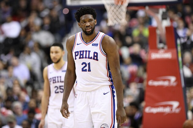 Philadelphia 76ers center Joel Embiid (21) stands on the court during the second half of an NBA basketball game against the Washington Wizards, Wednesday, Jan. 9, 2019, in Washington. The Wizards won 123-106. (AP Photo/Nick Wass)