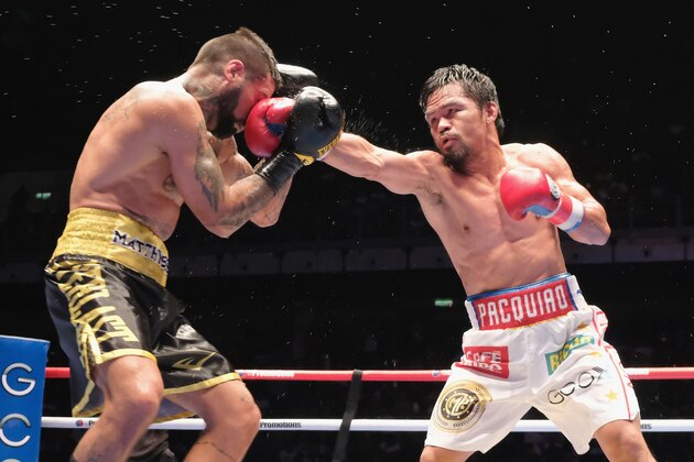 KUALA LUMPUR, MALAYSIA - JULY 15:  Manny Pacquiao of the Phillipines and Lucas Matthysse of Argintine in action on July 15, 2018 in Kuala Lumpur, Malaysia.  (Photo by How Foo Yeen/Getty Images)
