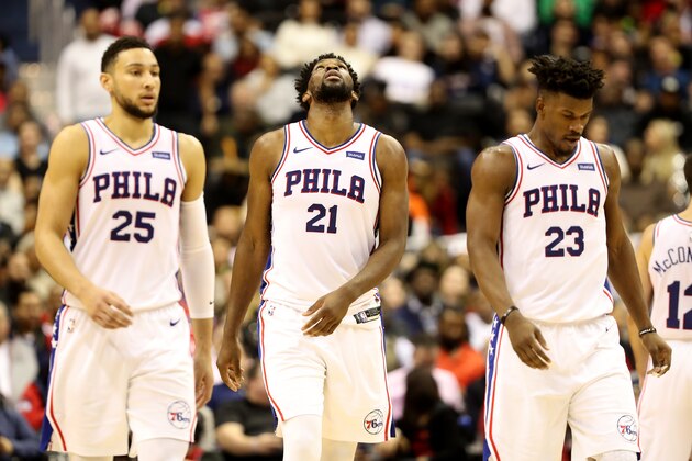 WASHINGTON, DC - JANUARY 09: Ben Simmons #25, Joel Embiid #21, and Jimmy Butler #23 of the Philadelphia 76ers look on in the second half Washington Wizards at Capital One Arena on January 09, 2019 in Washington, DC. NOTE TO USER: User expressly acknowledges and agrees that, by downloading and or using this photograph, User is consenting to the terms and conditions of the Getty Images License Agreement. (Photo by Rob Carr/Getty Images)