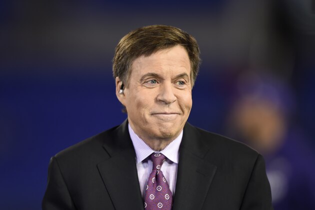 Sportscaster Bob Costas sits on a stage before an NFL football game between the Baltimore Ravens and the Cleveland Browns, Thursday, Nov. 10, 2016, in Baltimore. (AP Photo/Gail Burton)