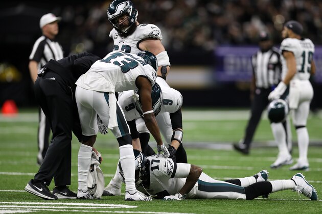 NEW ORLEANS, LOUISIANA - JANUARY 13: Nick Foles #9 of the Philadelphia Eagles talks with Alshon Jeffery #17 of the Philadelphia Eagles after a missed catch against the New Orleans Saints  during the NFC Divisional Playoff at the Mercedes Benz Superdome on January 13, 2019 in New Orleans, Louisiana. (Photo by Chris Graythen/Getty Images)