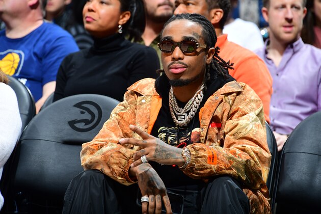 ATLANTA, GA - DECEMBER 26: Hip-Hop artist Quavo sits court-side against the Atlanta Hawks and Indiana Pacers on December 26, 2018 at State Farm Arena in Atlanta, Georgia.  NOTE TO USER: User expressly acknowledges and agrees that, by downloading and/or using this Photograph, user is consenting to the terms and conditions of the Getty Images License Agreement. Mandatory Copyright Notice: Copyright 2018 NBAE (Photo by Scott Cunningham/NBAE via Getty Images)