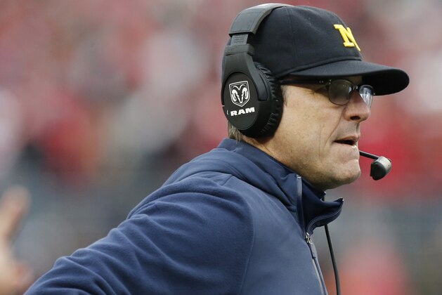 Michigan head coach Jim Harbaugh watches his team from the sidelines during the first half of their an NCAA college football game against Ohio State, Saturday, Nov. 24, 2018, in Columbus, Ohio. (AP Photo/Jay LaPrete)
