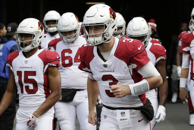 Arizona Cardinals quarterback Josh Rosen (3) leads his team onto the field to warm-up before an NFL football game against the Seattle Seahawks, Sunday, Dec. 30, 2018, in Seattle. (AP Photo/John Froschauer)