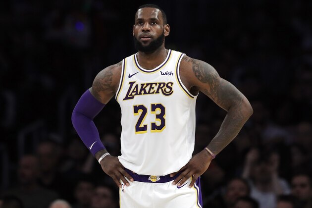 FILE - In this Dec. 23, 2018, file photo, Los Angeles Lakers' LeBron James stands during the first half of an NBA basketball game against the Memphis Grizzlies in Los Angeles. James is sorry for posting a lyric that referenced