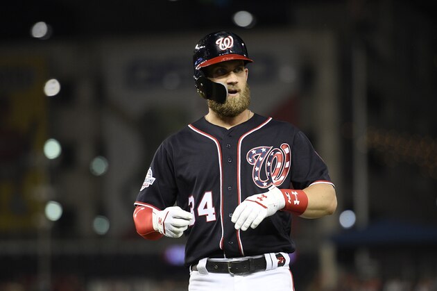 Washington Nationals' Bryce Harper stands on the field during a baseball game against the New York Mets, Friday, Sept. 21, 2018, in Washington. The Mets won 4-2. (AP Photo/Nick Wass)