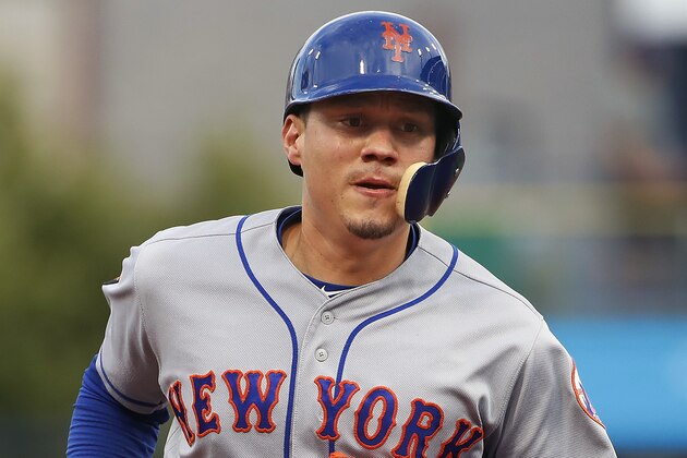 New York Mets' Wilmer Flores rounds third base after hitting a two-run home run off Pittsburgh Pirates starting pitcher Nick Kingham during the first inning of a baseball game in Pittsburgh, Thursday, July 26, 2018. (AP Photo/Gene J. Puskar) New York Mets' Wilmer Flores rounds third base after hitting a two-run home run off Pittsburgh Pirates starting pitcher Nick Kingham during the first inning of a baseball game in Pittsburgh, Thursday, July 26, 2018. (AP Photo/Gene J. Puskar)