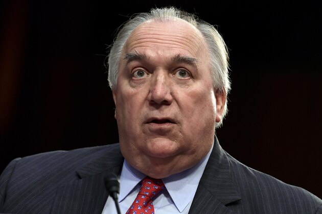 FILE - In this July 24, 2018 file photo, Michigan State University Interim President John Engler speaks during a Senate Commerce subcommittee hearing on FILE - In this July 24, 2018 file photo, Michigan State University Interim President John Engler speaks during a Senate Commerce subcommittee hearing on