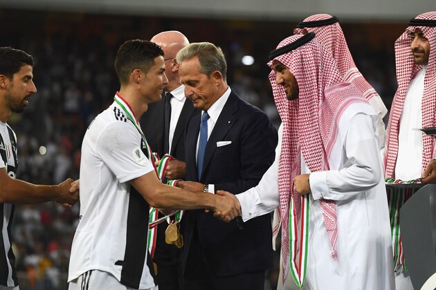 JEDDAH, SAUDI ARABIA - JANUARY 16: Cristiano Ronaldo of Juventus receives the medal after the Italian Supercup match between Juventus and AC Milan at King Abdullah Sports City on January 16, 2019 in Jeddah, Saudi Arabia. (Photo by Claudio Villa/Getty Images for Lega Serie A)