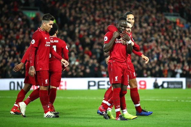 LIVERPOOL, ENGLAND - DECEMBER 29:  Sadio Mane of Liverpool celebrates with team mates after scoring his sides third goal during the Premier League match between Liverpool FC and Arsenal FC at Anfield on December 29, 2018 in Liverpool, United Kingdom.  (Photo by Clive Brunskill/Getty Images)