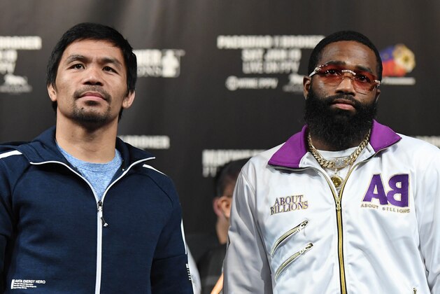 LAS VEGAS, NEVADA - JANUARY 16:  WBA welterweight champion Manny Pacquiao (L) and Adrien Broner pose during a news conference at MGM Grand Hotel & Casino on January 16, 2019 in Las Vegas, Nevada. Pacquiao will defend his title against Broner on January 19 at MGM Grand Garden Arena in Las Vegas.  (Photo by Ethan Miller/Getty Images)