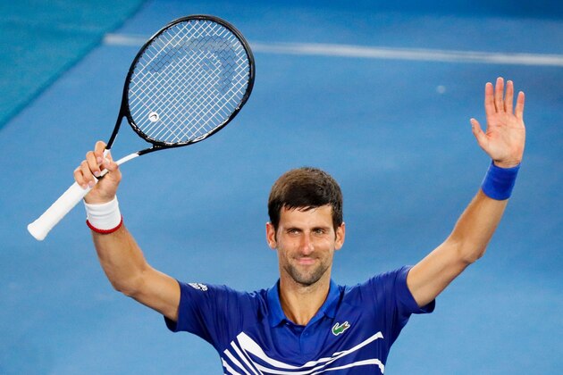Serbia's Novak Djokovic celebrates his victory against France's Jo-Wilfried Tsonga after winning their men's singles match on day four of the Australian Open tennis tournament in Melbourne early January 18, 2019. (Photo by DAVID GRAY / AFP) / -- IMAGE RESTRICTED TO EDITORIAL USE - STRICTLY NO COMMERCIAL USE --        (Photo credit should read DAVID GRAY/AFP/Getty Images)
