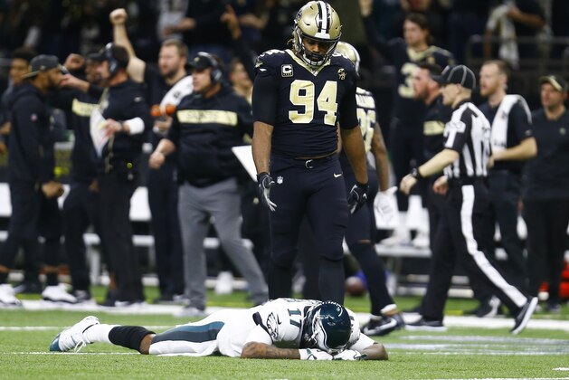 FILE - In this Sunday, Jan. 13, 2019, file photo, Philadelphia Eagles wide receiver Alshon Jeffery (17) lies on the turf in front of New Orleans Saints defensive end Cameron Jordan (94) after the Saints intercepted a pass in the second half of an NFL divisional playoff football game in New Orleans. The Saints defense will take on one of the NFL's best offenses in the NFC title game against the Los Angeles Rams. (AP Photo/Butch Dill, File)