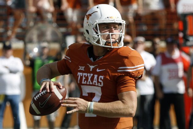 Texas quarterback Shane Buechele looks to throw during the first half of an NCAA college football game against  West Virginia, Saturday, Nov. 12, 2016, in Austin, Texas. (AP Photo/Michael Thomas)