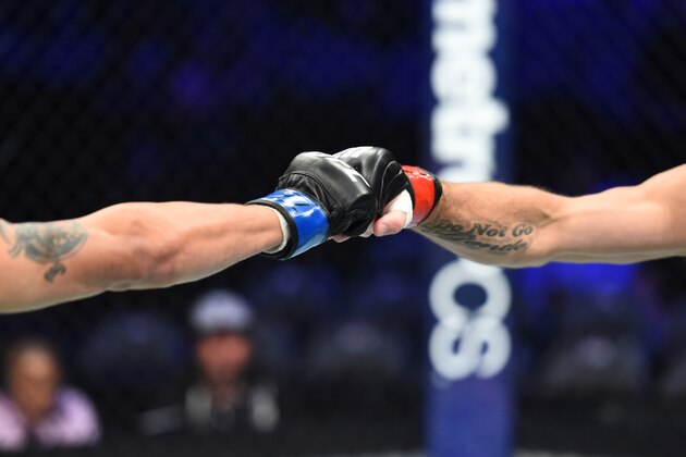 DALLAS, TX - SEPTEMBER 08:  Jim Miller and Alex White touch gloves in their lightweight fight during the UFC 228 event at American Airlines Center on September 8, 2018 in Dallas, Texas. (Photo by Josh Hedges/Zuffa LLC/Zuffa LLC via Getty Images)