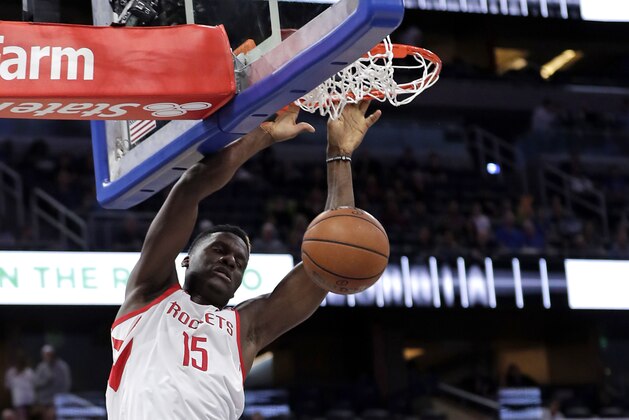 Houston Rockets' Clint Capela (15) dunks the ball against the Orlando Magic during the first half of an NBA basketball game, Sunday, Jan. 13, 2019, in Orlando, Fla. (AP Photo/John Raoux)