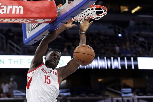 Houston Rockets' Clint Capela (15) dunks the ball against the Orlando Magic during the first half of an NBA basketball game, Sunday, Jan. 13, 2019, in Orlando, Fla. (AP Photo/John Raoux)