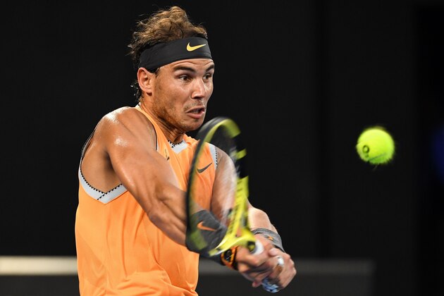 Spain's Rafael Nadal hits a return against Australia's Alex de Minaur during their men's singles match on day five of the Australian Open tennis tournament in Melbourne on January 18, 2019. (Photo by WILLIAM WEST / AFP) / -- IMAGE RESTRICTED TO EDITORIAL USE - STRICTLY NO COMMERCIAL USE --        (Photo credit should read WILLIAM WEST/AFP/Getty Images)