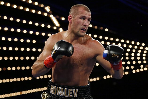 Sergey Kovalev, of Russia, fights Igor Mikhalkin, of Russia, during the fourth round of a WBO light heavyweight title boxing match Saturday, March 3, 2018, in New York. Kovalev won the bout. (AP Photo/Adam Hunger)