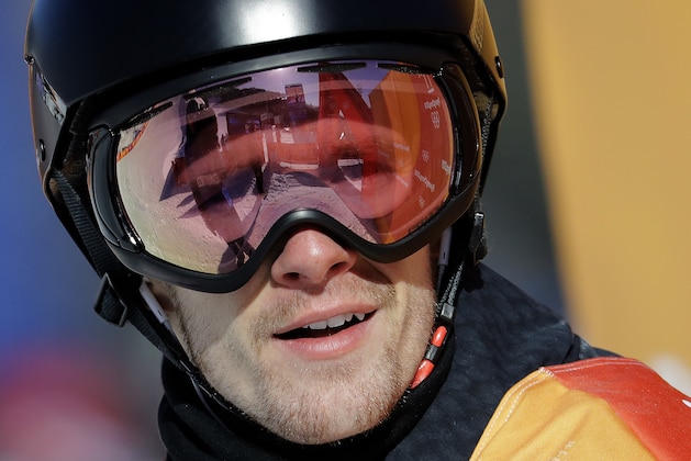 Max Parrot, of Canada, looks at his scores after his run during the men's slopestyle final at Phoenix Snow Park at the 2018 Winter Olympics in Pyeongchang, South Korea, Sunday, Feb. 11, 2018. (AP Photo/Lee Jin-man)