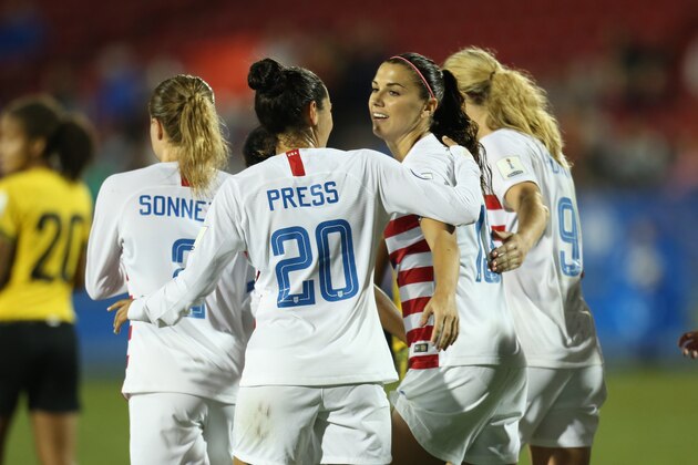 FRISCO, TX - OCTOBER 14: Alex Morgan of USA celebrates after scoring a goal during the semifinal match between Jamaica and United States as part of CONCACAF Women's Championship at Toyota Stadium on October 14, 2018 in Frisco, Texas. (Photo by Omar Vega/Getty Images)
