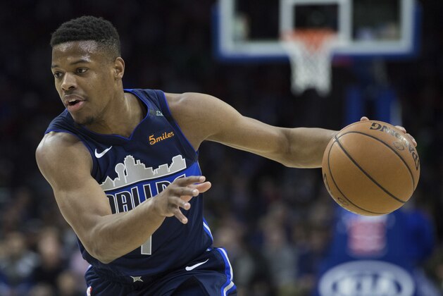 Dallas Mavericks' Dennis Smith Jr. in action during the first half of an NBA basketball game against the Philadelphia 76ers, Sunday, April 8, 2018, in Philadelphia. The 76ers won 109-97. (AP Photo/Chris Szagola)