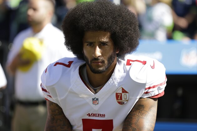 San Francisco 49ers' Colin Kaepernick kneels during the national anthem before an NFL football game against the Seattle Seahawks, Sunday, Sept. 25, 2016, in Seattle. (AP Photo/Ted S. Warren)